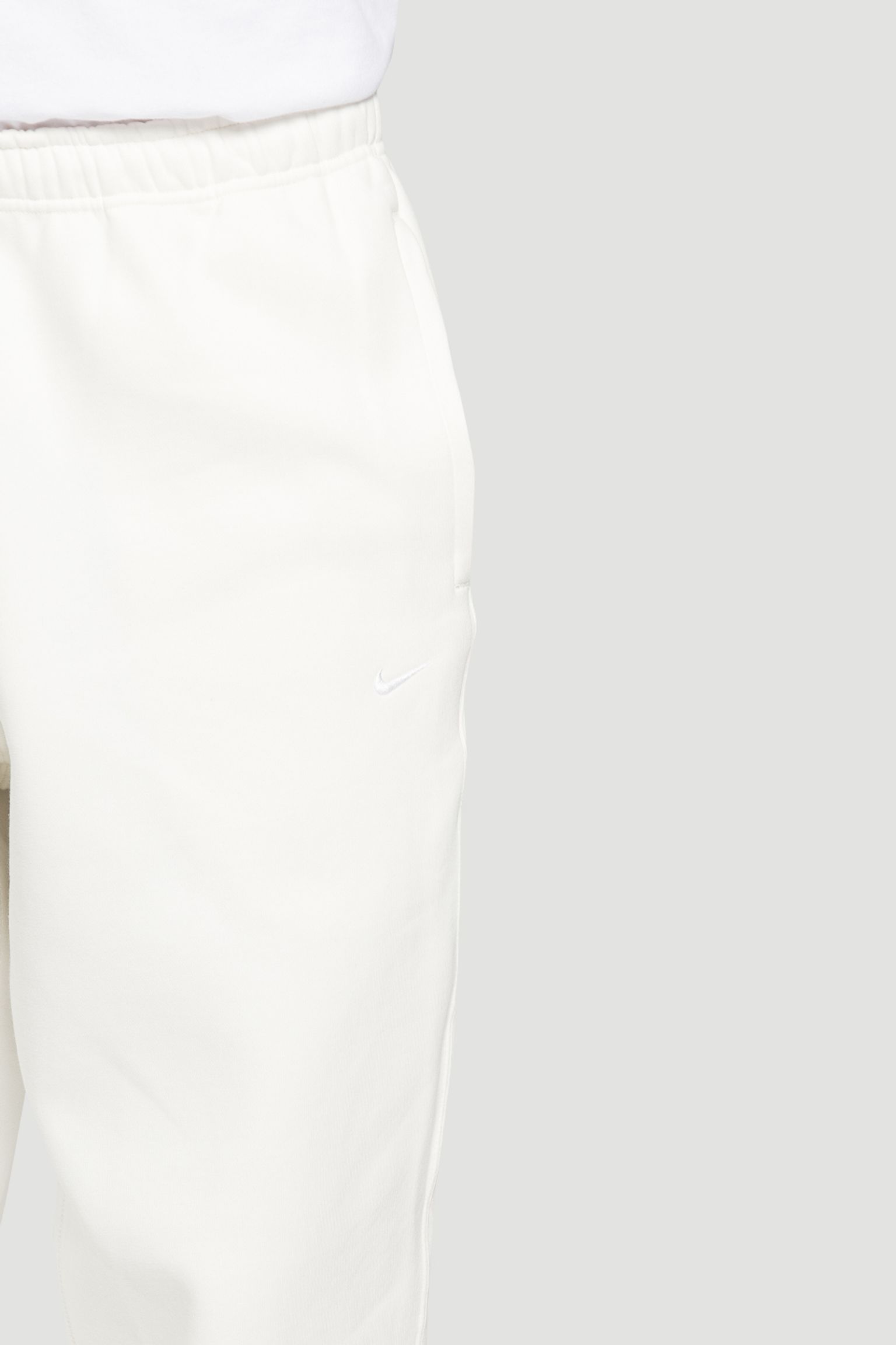 Широкий выбор Спортивные брюки   M NK SOLO SWSH FLC CF PANT